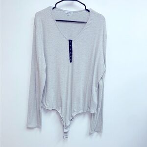 White Birch Light Gray Bodysuit with Black Button Detail on chest.